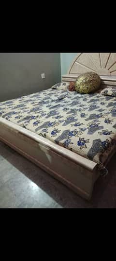 beautiful bed with dressing table also having divider