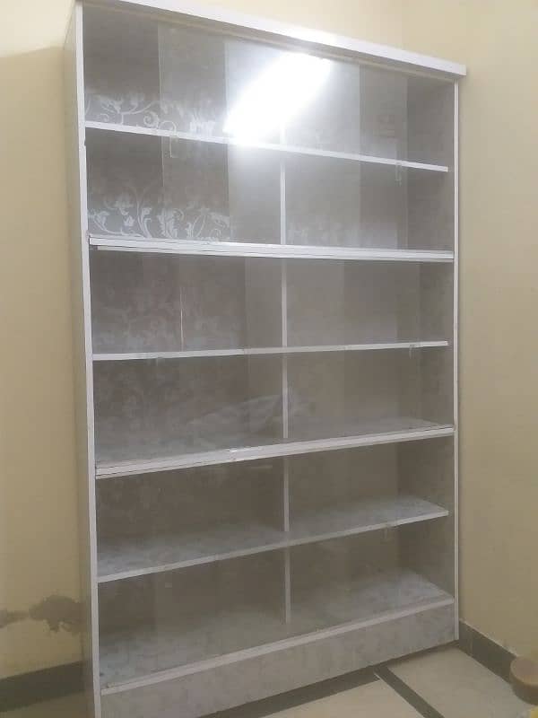Used storage Table with 12 Storage Sections – Good Condition. 0
