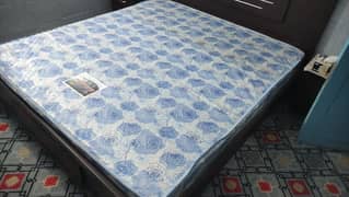 king size bed along with side tables