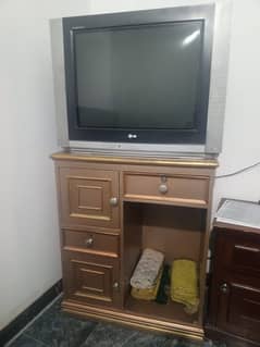 L. G tv with wood tv trolley