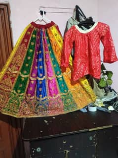 2 pcs mehndi lehnga full heavy embroidery with simple red shirt