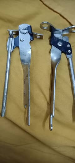 Tin cutter can opener bottle opener