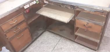 L shaped cash counter for sale and it is made of firm and durable wood