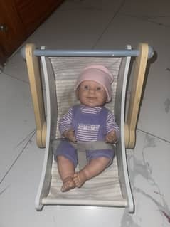Doll with doll baby cot