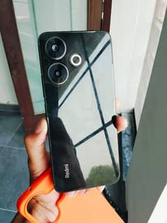 redmi 13 Box b h charger b ha 1 month use huwa condition 10 by 10