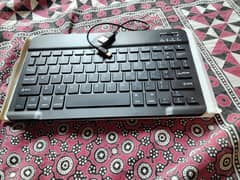 Wireless keyboard with original charging cable