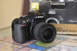 Nikon d5300 with 18-55 mm lens and box
