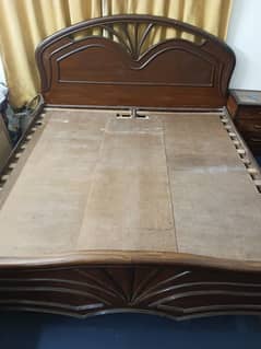 wooden double bed without mattress