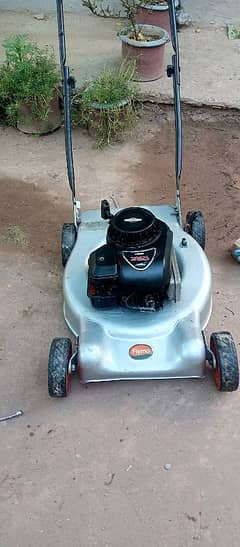 Flymo petrol lawn mower