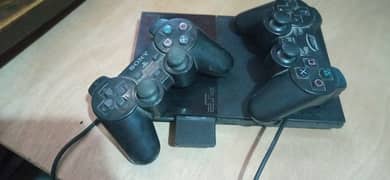 ps2 slim with two controllers jailbreak imported from Dubai