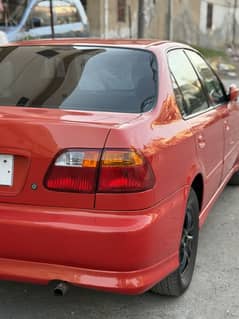 Honda Civic 1998 converted to 2000 scratchless body True Tone paint