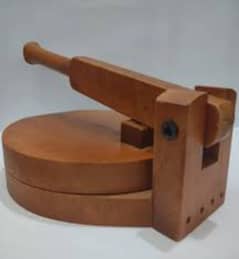 roti maker. . wooden roti maker