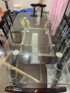 Dining table with 6 chairs with double glass top