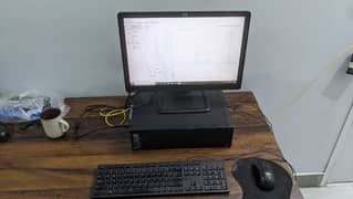 Dell EliteDesk with HP monitor and keyboard mouse