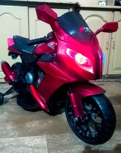 kids sport bike unique design with dual motor All ok working condition