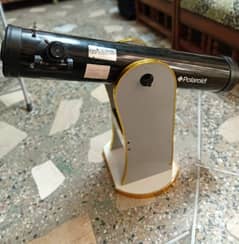 Polaroid reflector telescope