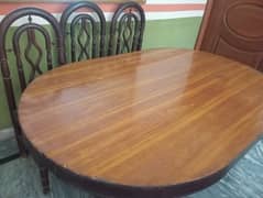 Wooden dining table with 6 chairs