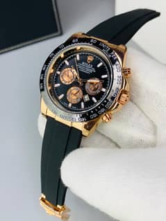 Golden and Black Rolex Watch