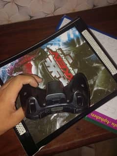 Xbox 360 with one original controller  and 80 games are installed