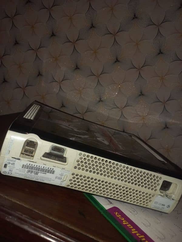 Xbox 360 with one original controller  and 80 games are installed 3