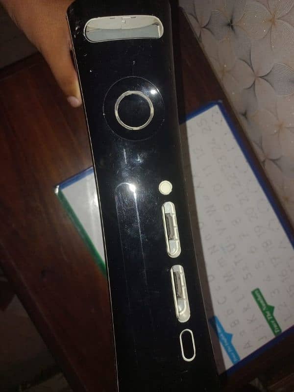 Xbox 360 with one original controller  and 80 games are installed 4