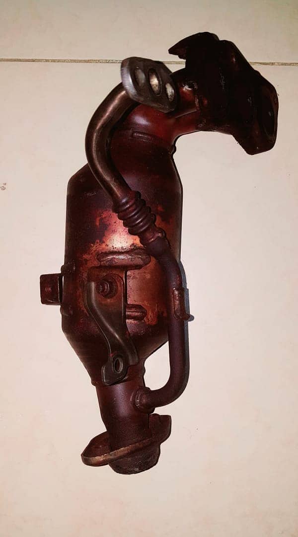 Catalytic converter (JAPANESE) for VITZ and retractable side mirror 1