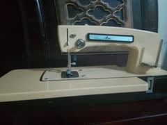 vintage mini sewing machine