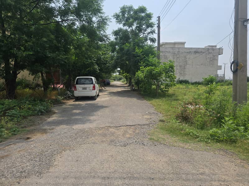 8 Marla sun face level plot next to Corner and 2nd plot from Main Double Road For sale 10