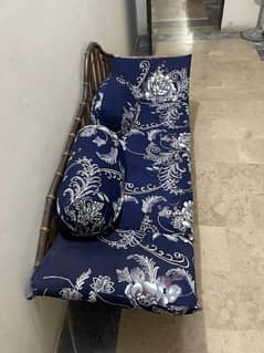 cane sofa