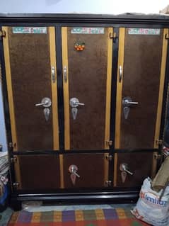 A heavy iron 3 door almari