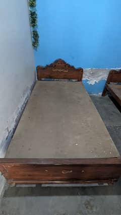 Strong wooden two single beds