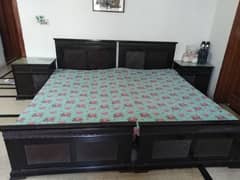 2 single beds with two Molty foam mattress and two site tables