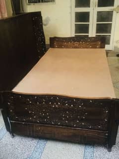 2 single wooden beds for sale in good condition