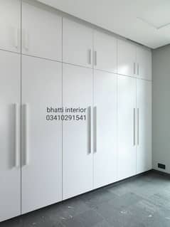 wordeobe almari cupboard kitchens media wall