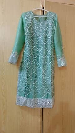 An olive green formal dress is on sale price