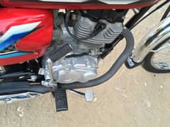 Honda 125 red 1650 km driving