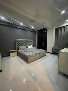 E11 two bedrooms fully luxurious furnished apartment available for rent