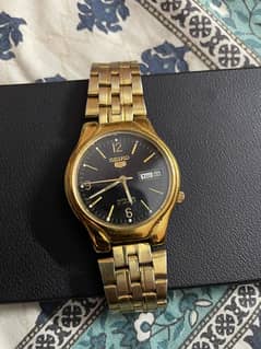 seiko 5 7S26 glass back