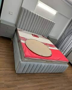 bed drasing side tables and puffy