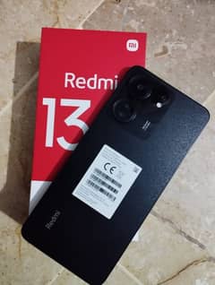Redmi 13c  6+128gb colour black warranty available 5 months