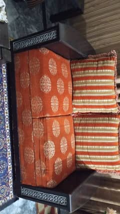 magenta colour sofa in good condition