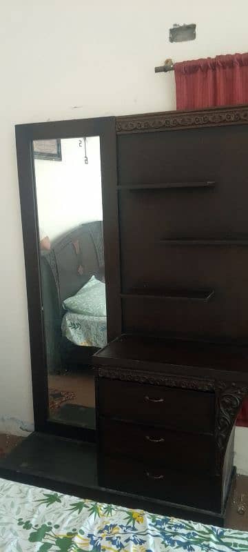 king size bed with stylish dressing table and side table. 2
