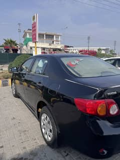 Toyota Xli 2010 model converted gli lahore number