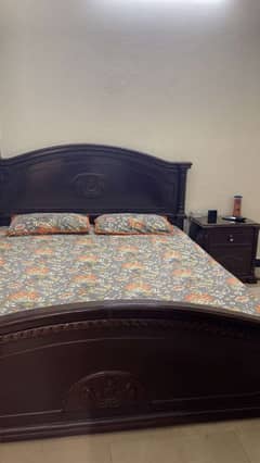 Double Bed with 2 side tables.