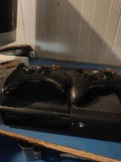 xbox 360 slim with 2 controller