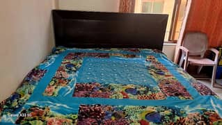 double bed with spring mattress
