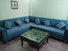 L-shape seven seater sofa with center table