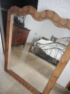 Mirror with wooden frame for sale