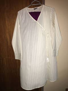 It's off-white angrakha style 3 piece suit