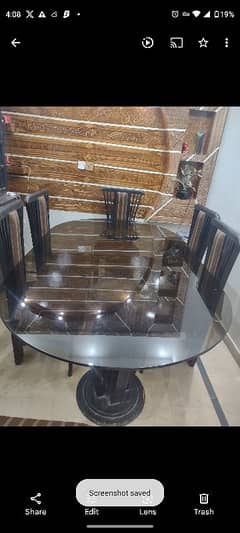heavy glass dining table with 6 chairs